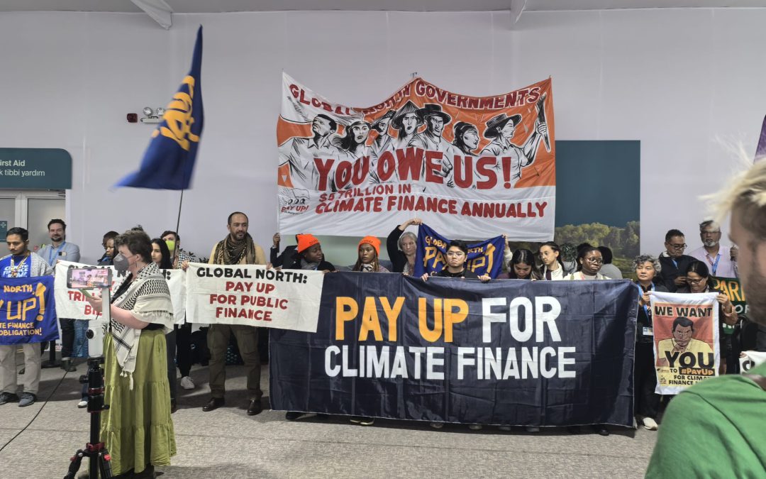 picture of protesters during COP29