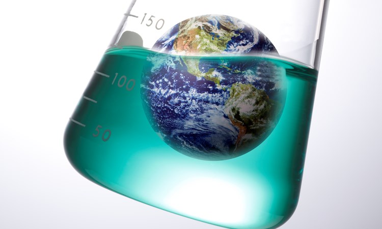 Computer-generated image of Earth being rinsed in a laboratory flask