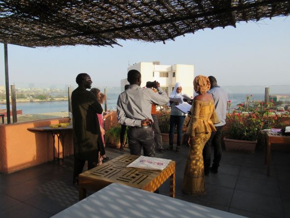 UCAD Students practicing the immersive theatre session the day before during a beautiful sunset on the rooftop bar we converted into our office for the week